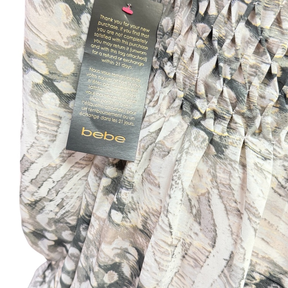 BEBE Dress with plenty smocking on shoulders , sleeves and yoke of the skirt. - Picture 6 of 9